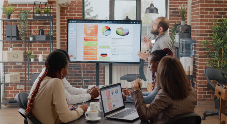 Business man talking to workmates about project planning and strategy